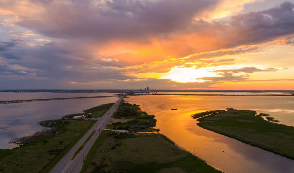 View of the Mobile Bay causeway at sunset in Alabama