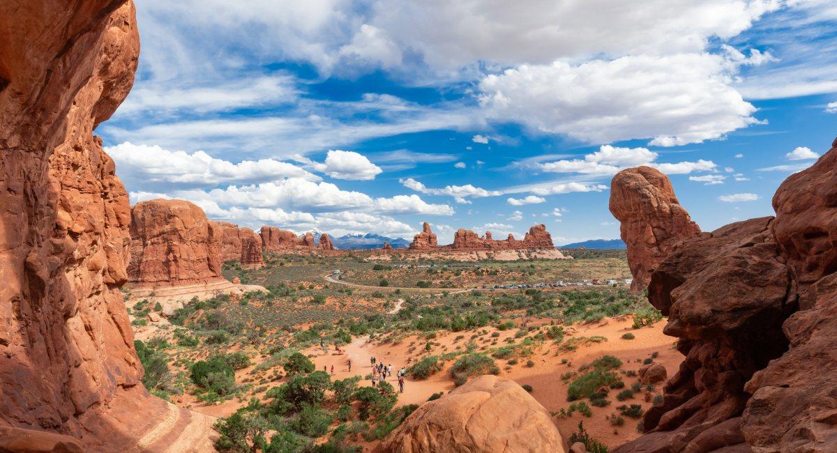 Red sandstone arches and desert landscape at Arches National Park Utah, showing natural stone formations visible on RV trip from Colorado Springs